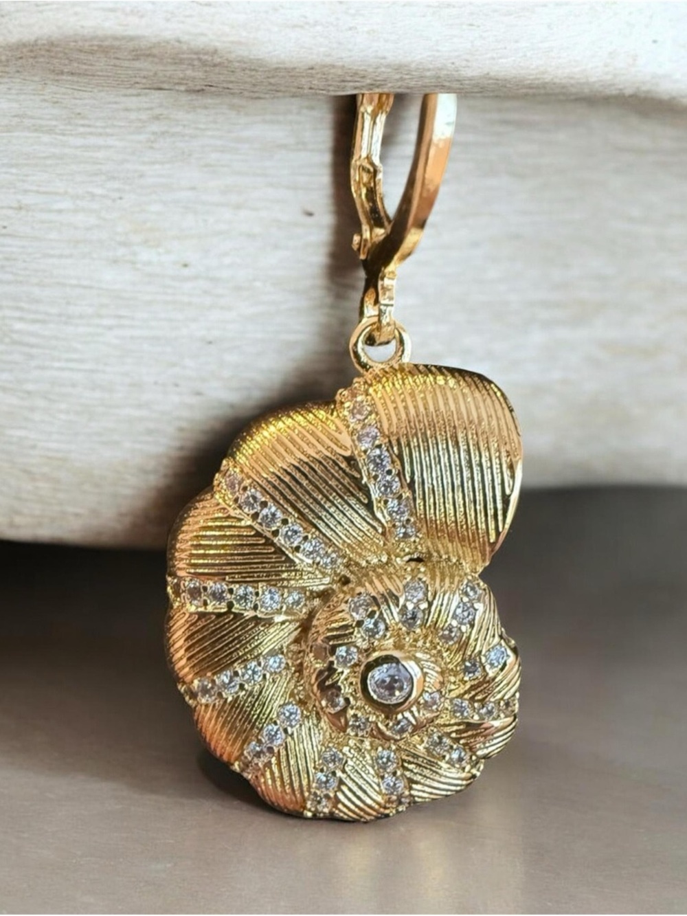 Gemelli Shell Huggie Charm on an Elegant Gold tone Necklace
